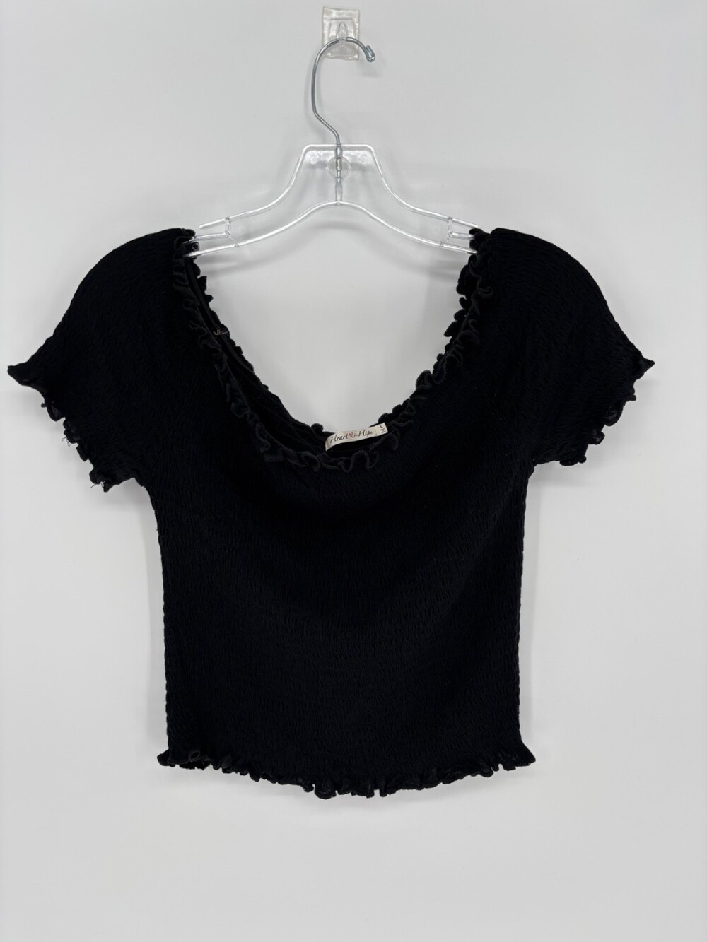 Black smocked stretchy ribbed scalloped off-the-shoulder crop top